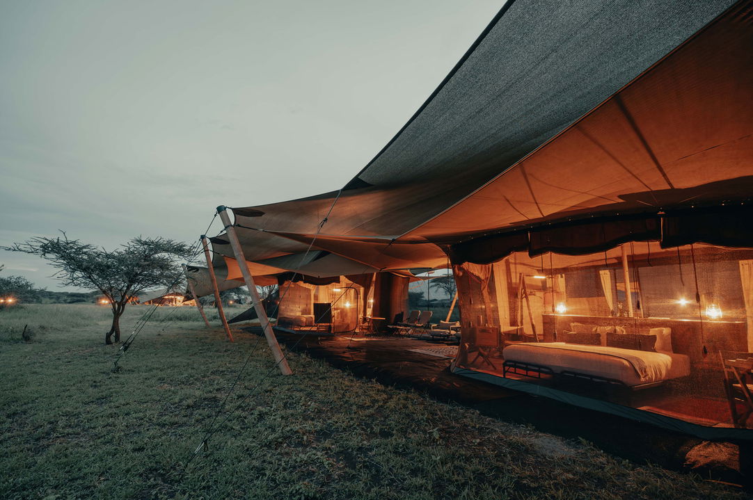 evening view of exterior of family tent by Wilderness Usawa tented camp Serengeti