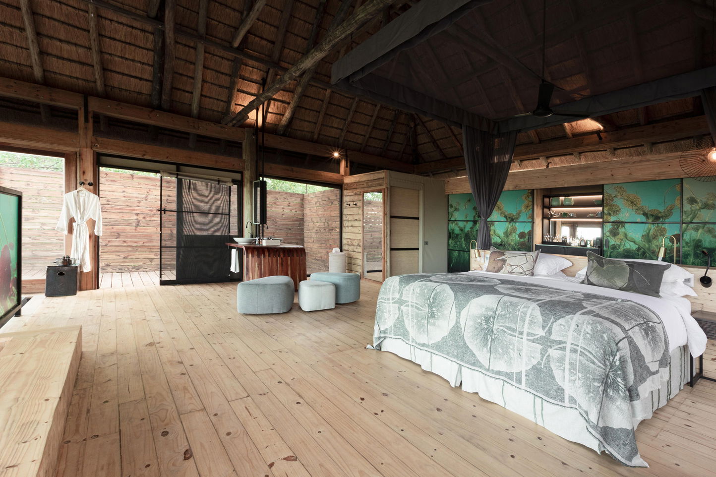 interior of luxury room with open views on delta at Vumbura plains Botswana