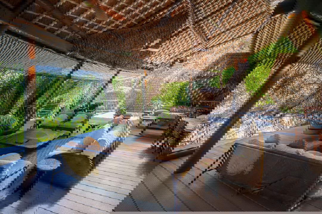 main lounge seating area with couches at Jao Camp Wilderness Okavango Delta Botswana