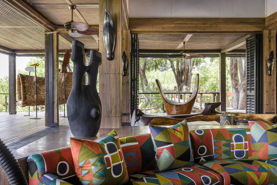 Xigera Lodge Botswana main lodge lounge area with couches