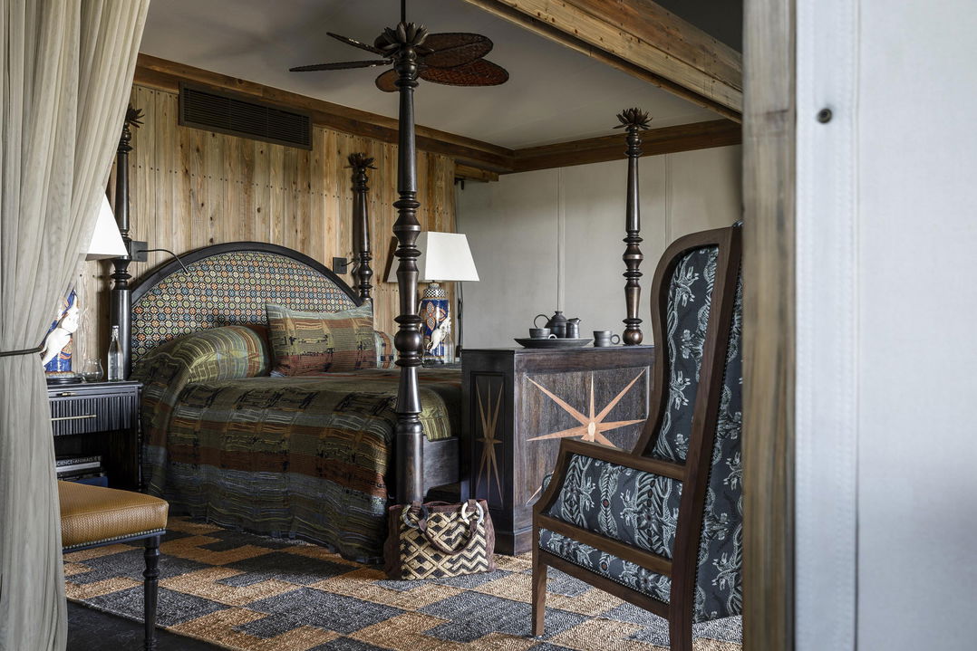 view of bed in bedroom of suite at Xigera Lodge Botswana