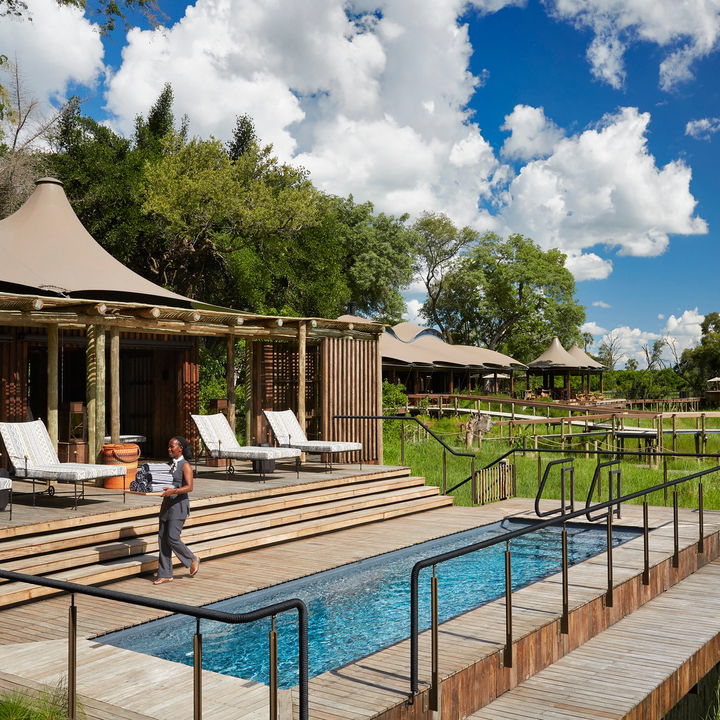 pool deck with loungers at Xigera safari lodge Okavango Delta Bostwana