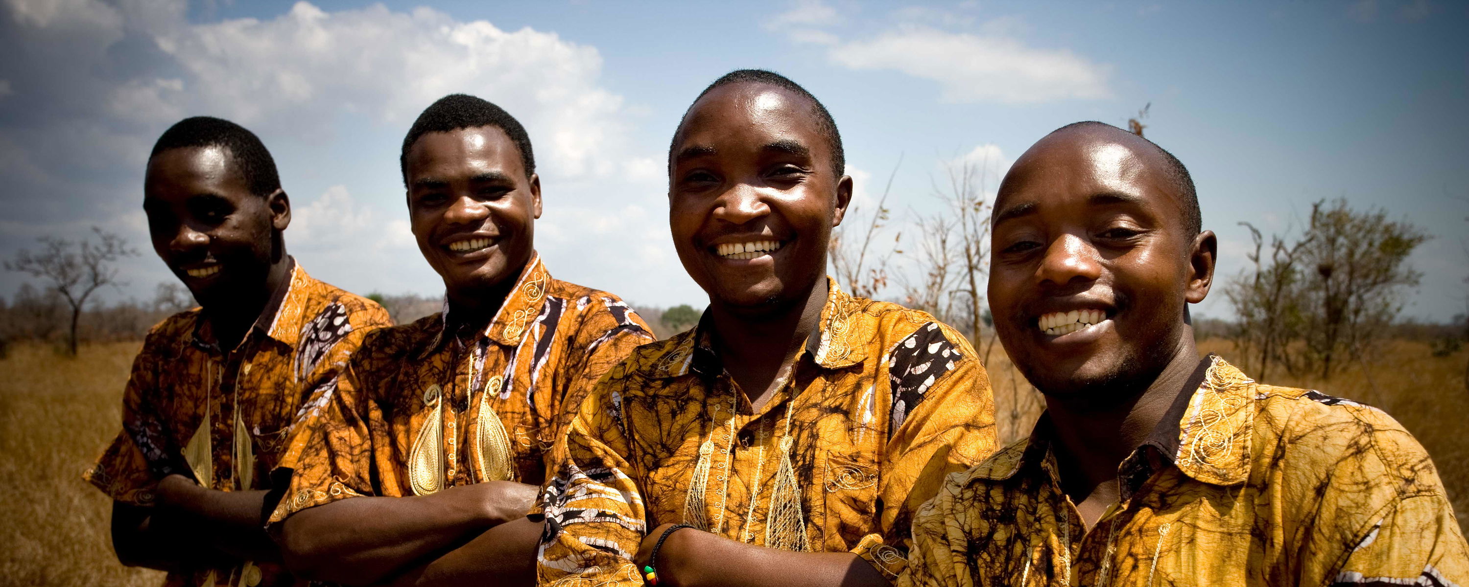 Happy staff members at Stanley's kopje, Mikumi National Park