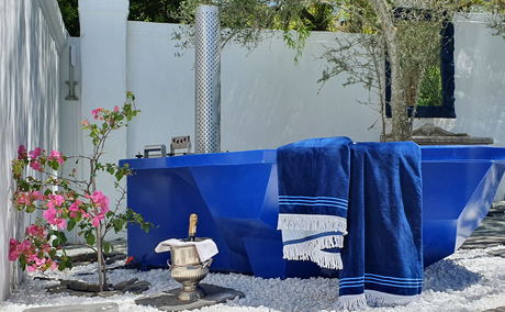 KolKol wood fired hot tub pool area at 5 star De Kloof Luxury Estate boutique hotel and spa Swellendam Western Cape South Africa KolKol wood fired hot tub pool area at 5 star De Kloof Luxury Estate boutique hotel and spa Swellendam Western Cape South Africa