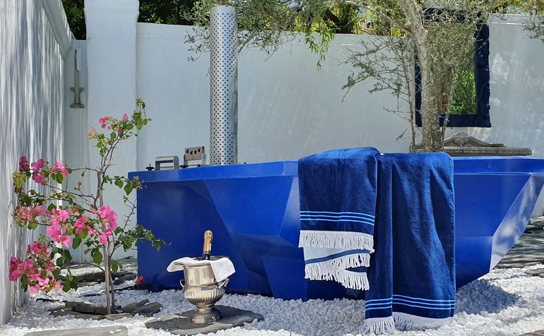 KolKol wood fired hot tub pool area at 5 star De Kloof Luxury Estate boutique hotel and spa Swellendam Western Cape South Africa KolKol wood fired hot tub pool area at 5 star De Kloof Luxury Estate boutique hotel and spa Swellendam Western Cape South Africa