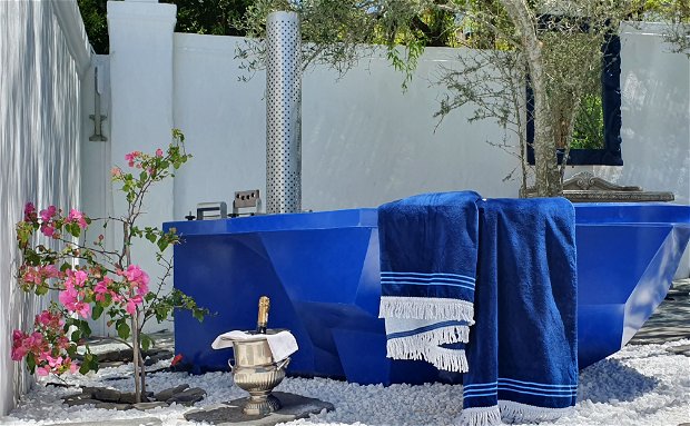 KolKol wood fired hot tub pool area at 5 star De Kloof Luxury Estate boutique hotel and spa Swellendam Western Cape South Africa KolKol wood fired hot tub pool area at 5 star De Kloof Luxury Estate boutique hotel and spa Swellendam Western Cape South Africa