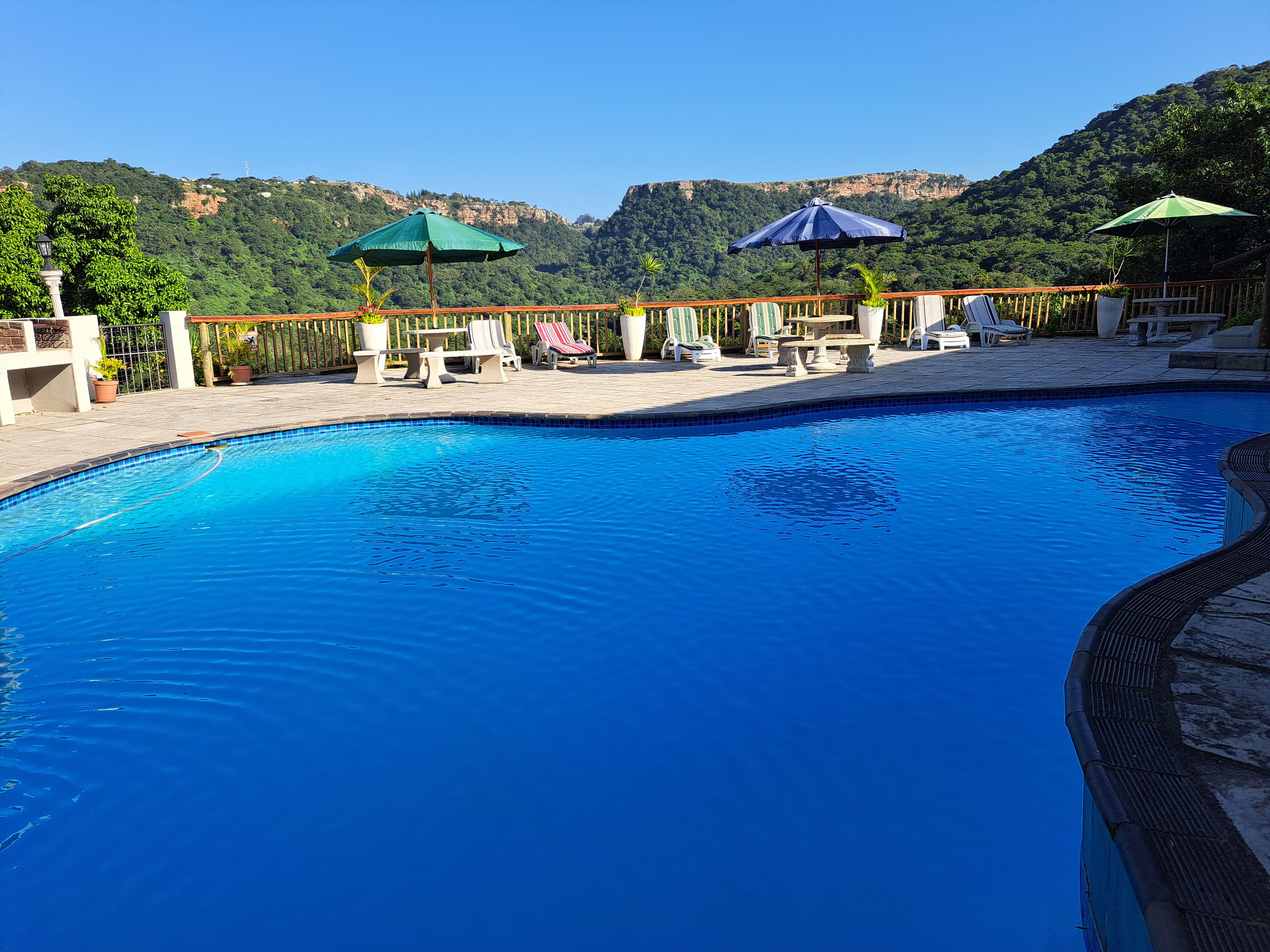 Relax in Style: Pool and Braai Areas with Breathtaking Views"