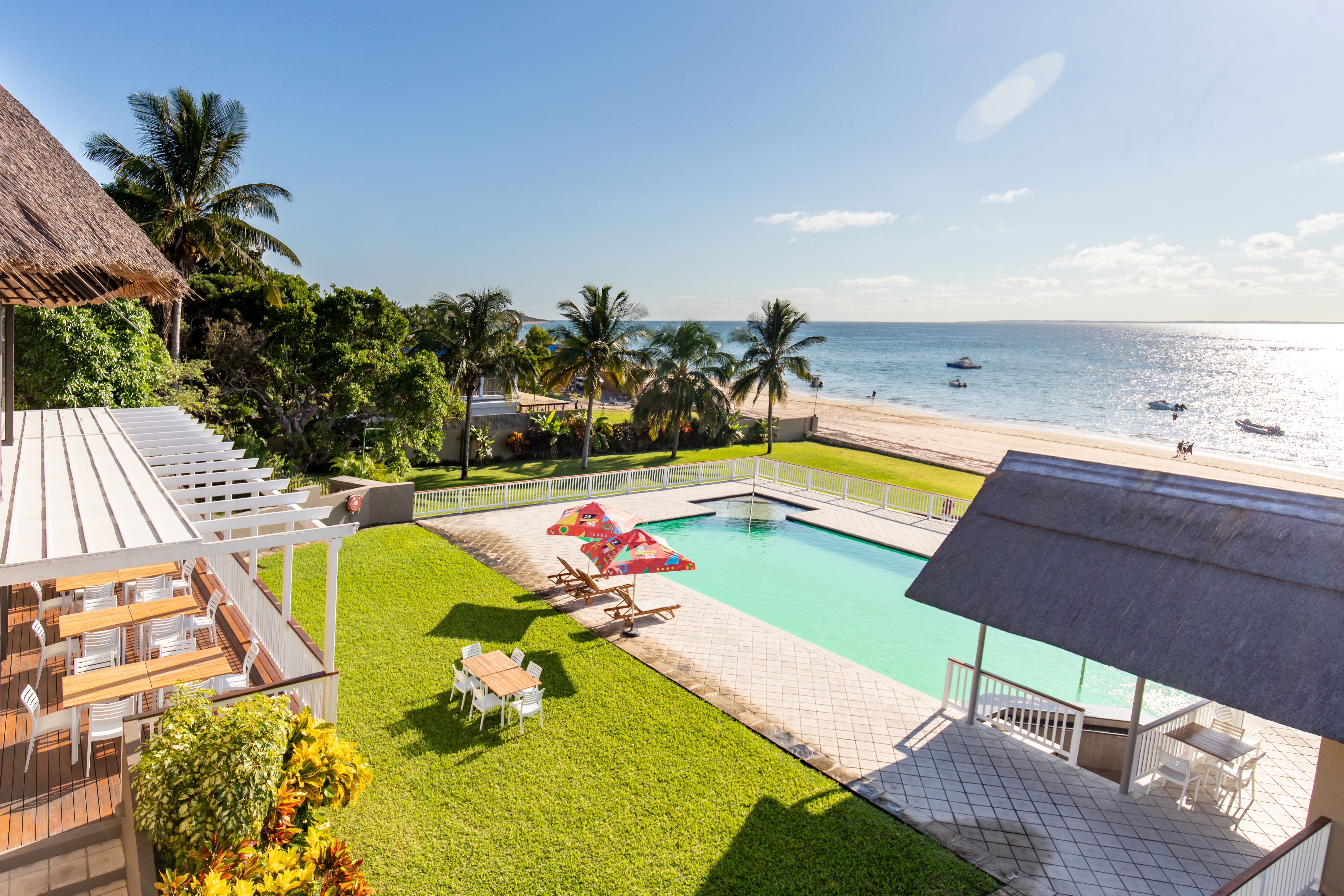 Bird's view of pool, lawns, beach and ocean!